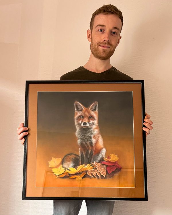 French pastel artist Benoît Jeanmaire holding original artwork